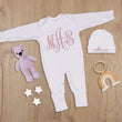 Load image into Gallery viewer, Baby girl white sleeper pink monogram

