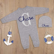 Load image into Gallery viewer, Baby boy gray sleeper with blue monogram
